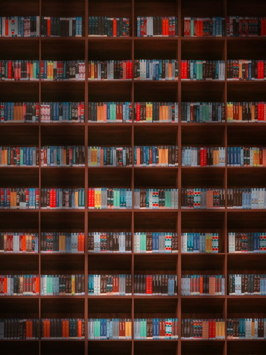 Wall of bookshelves filled with colorful books